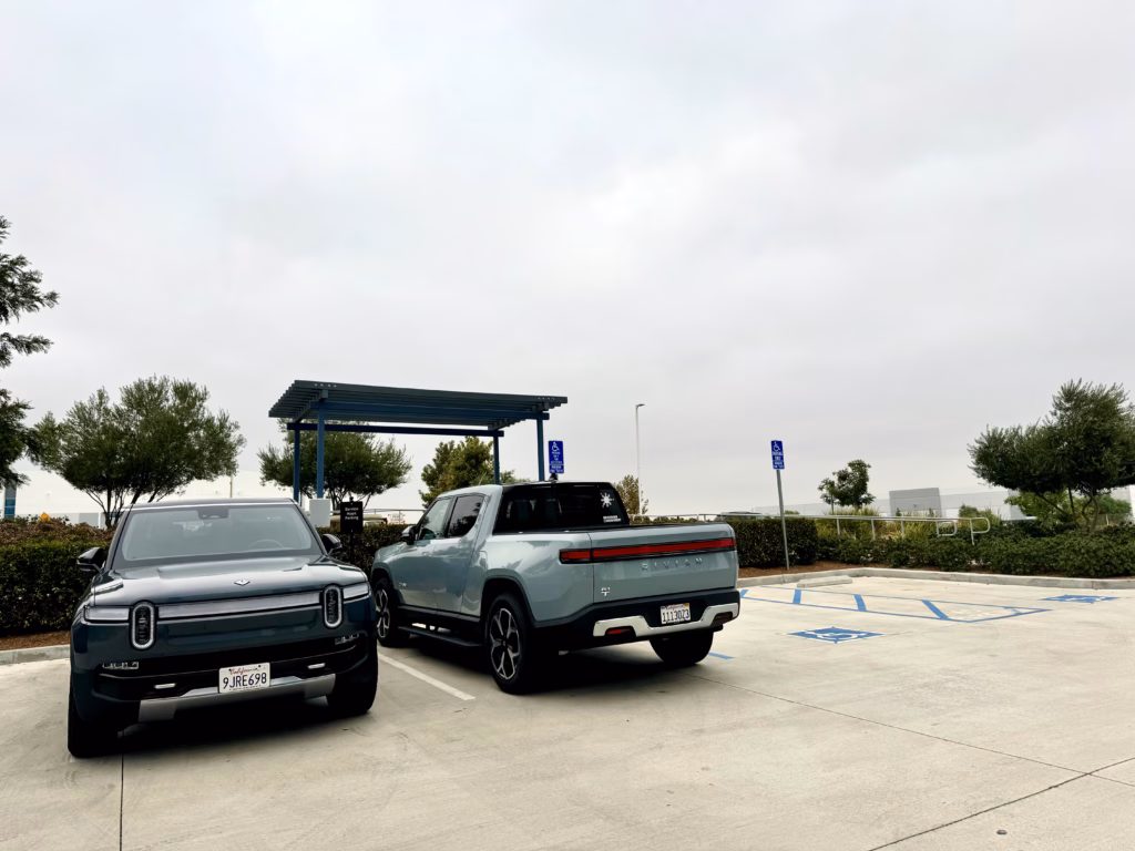 Rivian R1S next to R1T