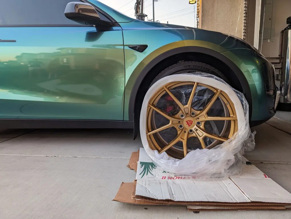 RVRN MB373 on the side of Model Y Performance