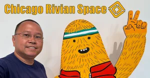 Me standing next to Gear Guard Gary at Rivian Chicago