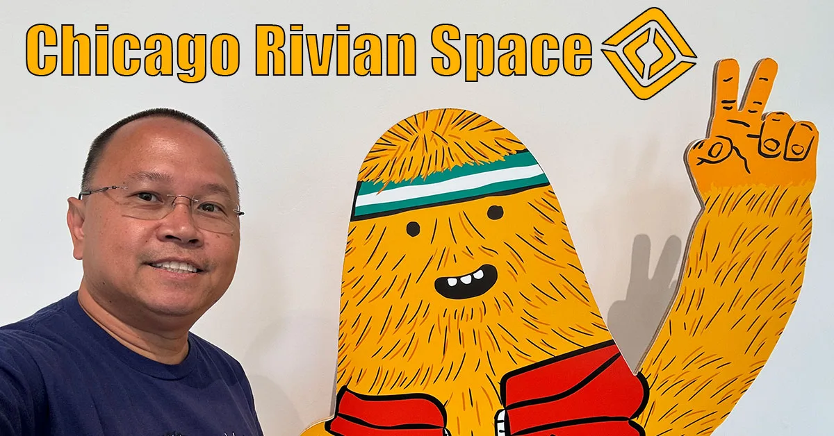 Me standing next to Gear Guard Gary at Rivian Chicago