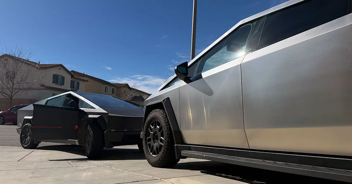 two cybertrucks on the driveway