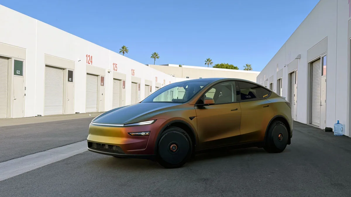 Side view of wrapped Model Y Juniper with Halodisc Haloblk