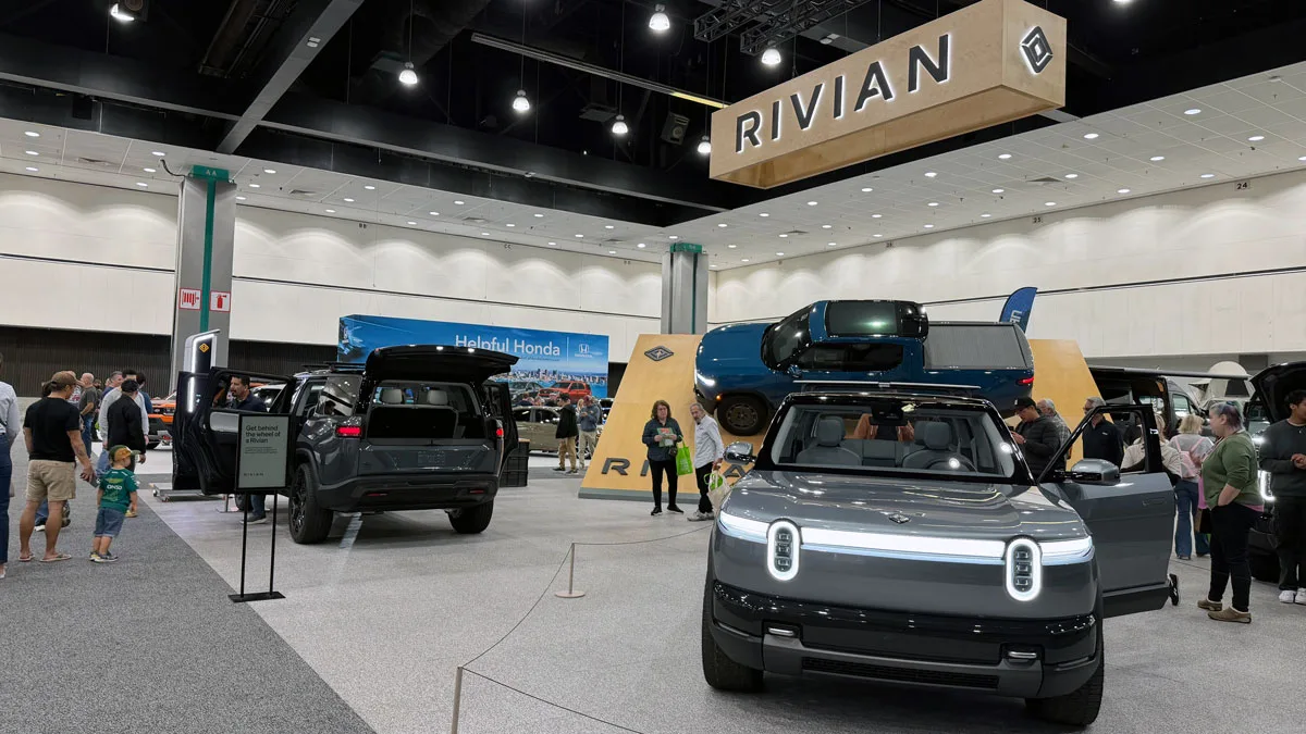 Rivian R2 next to R1S